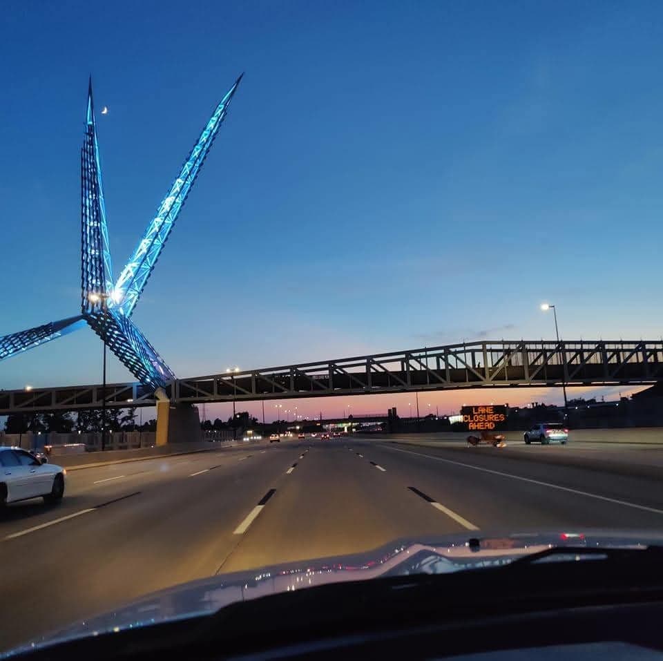 The SkyDance pedestrian bridge over Interstate 40 in Oklahoma City at dusk
